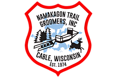 logo namakagon trail groomers